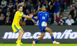 Illya Zabarnyi of Ukraine and Bradley Barcola of France play during the 2026 World Cup qua...