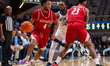 Jaden Slaughter (4) drives the ball for the Sacred Heart Pioneers during an NCAA basketbal...