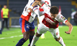 Joaquien Sosa of Independiente Santa Fe and Ruben Manjarres of Alianza fight for the ball...