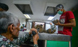 A team of geologists from the Bandung Geological Museum cleans one part of an ancient elep...