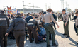 Protesters, both clergy members and secular individuals, are taken into custody while demo...