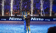 Jannik Sinner of Italy holds the trophy in the Final Men's Singles Round match against Car...