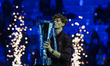 Jannik Sinner of Italy holds the trophy in the Final Men's Singles Round match against Car...