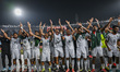 Bangladeshi players celebrate after winning the match during the third round of the Asian...