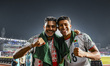 Shamit Shome and Cuba Raul Mitcheel of Bangladesh celebrate after winning the match during...