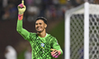 Goalkeeper Joao Pedro of Brazil celebrates after saving the penalty in the penalty shoot-o...