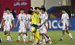 The players of Japan celebrate their victory with the fans after the penalty shootout at t...