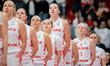 Kamila Borkowska and her teammates stand during the national anthem before the FIBA Women'...