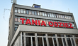 RZESZOW, POLAND – NOVEMBER 19:Advertisement for 'Tania Odziez,' a shop selling inexpensiv...