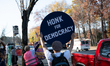 Protesters gather outside a Home Depot location to object to mass deportation efforts of f...