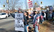 Protesters gather outside a Home Depot location to object to mass deportation efforts of f...