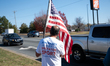 Protesters gather outside a Home Depot location to object to mass deportation efforts of f...