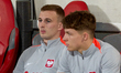 Kacper Kozlowski of Poland sits on the substitute bench ahead of the FIFA World Cup 26 UEF...