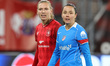Lieske Carleer of FC Twente and Amaiur Sarriegi of Atletico Madrid play during the match b...