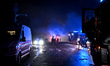 Rescue workers respond to the aftermath of an airstrike launched by Russian forces in the...