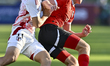 Hiroto Asada of Japan and Johannes Mathias Moser of Austria are in action during the FIFA...