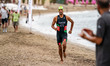 Wais Khairandesh of Afghanistan competes in the Elite Men's race at the 2025 Europe Triath...