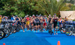 Athletes at transition in action during the Elite Men's race at the 2025 Europe Triathlon...