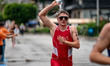 Florian Barenthaler of Austria competes in the Elite Men's race at the 2025 Europe Triathl...