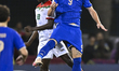 Thomas Campaniello of Italy and Eddie Kogo of Burkina Faso are in action during the FIFA U...