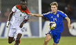 Fabio Pandolfi of Italy and Issouf Dabo of Burkina Faso are in action during the FIFA U-17...
