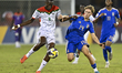 Fabio Pandolfi of Italy and Issouf Dabo of Burkina Faso are in action during the FIFA U-17...
