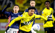 PSV Eindhoven defender Mauro Junior and NAC Breda forward Charles Brym play during the mat...