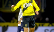 PSV Eindhoven defender Mauro Junior and NAC Breda midfielder Mohamed Nassoh play during th...