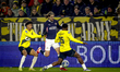 NAC Breda forward Charles Brym, PSV Eindhoven defender Yarek Gasiorowski, and NAC Breda de...