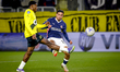 NAC Breda defender Cherrion Valerius and PSV Eindhoven forward Couhaib Driouech play durin...