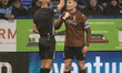 Referee Darren Drysdale shows a yellow card to Max Power #6 of Bradford City during the Sk...