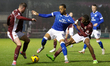 Tyrese Fornah of Northampton Town grabs Chris Willock of Cardiff City during the second ha...