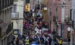 A panoramic view of a street in Lisbon, Portugal, on November 22, 2025, shows a group of a...