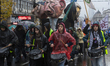 A column of protesters marches on Knez Milosa Street in Belgrade, Serbia, on November 22,...