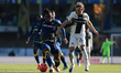 The contrast between Armel Bella-Kotchap of Hellas Verona FC and Oliver Sorensen of Parma...