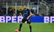 Hakan Calhanoglu plays during the Serie A match between FC Internazionale and AC Milan at...