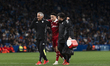 Ruben Vargas of Sevilla FC leaves the field injured and is helped off during the LaLiga EA...