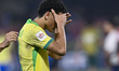 Angelo of Brazil stands dejected following defeat in the penalty shootout during the FIFA...