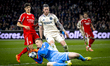 AFC Ajax Amsterdam forward Wout Weghorst and SL Benfica goalkeeper Anatoliy Trubin partici...