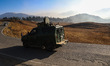 An Indian army vehicle moves at the famous ski resort Gulmarg in Jammu and Kashmir, India,...