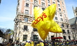 The Yellow Macy's Stars balloons during the 99th Macy's Thanksgiving Day Parade in New Yor...