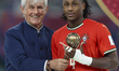 Mauro Furtado of Portugal poses for a photo with Bora Milutinovic, a Serbian former footba...