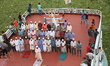 Bangladeshi Muslims offer noon prayers as they ride on ferry leaving capital city during t...