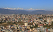 A snowcapped mountain range emerges over the Kathmandu Valley in Nepal on November 29, 202...