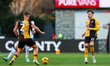 Cameron Evans of Newport County and Michael Spellman of Newport County are in action durin...