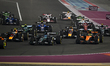 The pack corners on the opening lap during the Sprint race of the Formula One Qatar Grand...