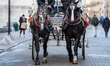 A horse carriage is seen in Krakow, Poland, on November 28, 2025. It is a popular tourist...