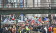 A protest march takes place in Giessen, Germany, on November 28, 2025, during a day of nat...