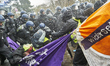 Police push protesters back and use water cannon in Giessen, Germany, on November 28, 2025...
