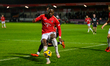 Louie Watson of Crawley Town tackles Daniel Udoh of Salford City FC during the Sky Bet Lea...